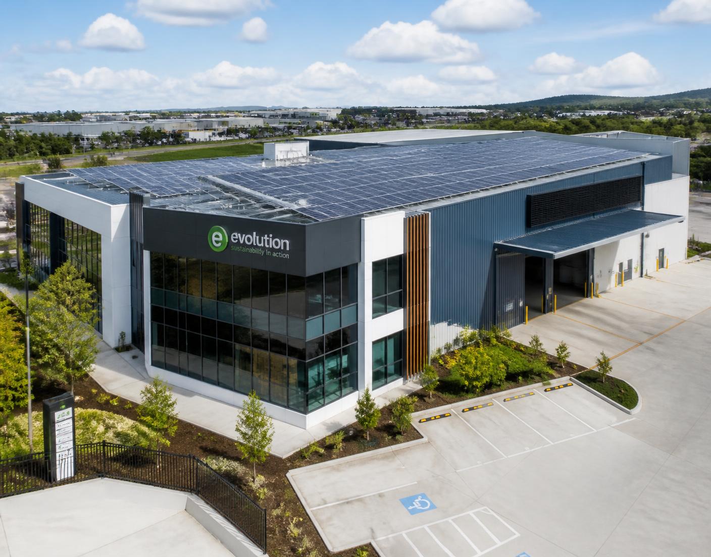Commercial office and warehouse building with rooftop solar panels
